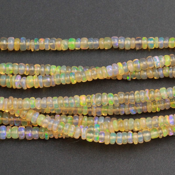 Ethiopian Opal Beads Rondelle Graduating 3mm 4mm AAA Super Flashy Fiery Rainbow Yellow Opal Smooth Rondelle Beads 15.5&quot; Strand A6