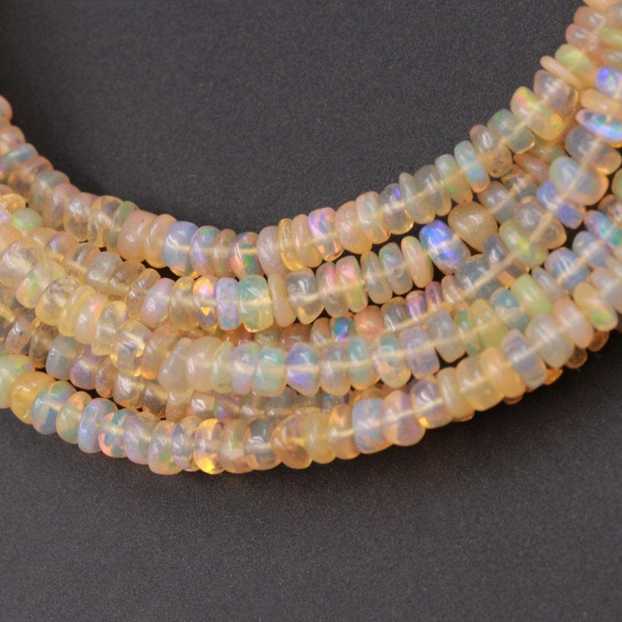 16 Inches Ethiopian Opal Beads Rondelle Graduating 3mm 4mm AAA Super Flashy Fiery Rainbow Yellow Opal Smooth Rondelle Beads 16" Strand A3