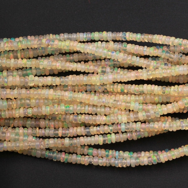 16 Inches Ethiopian Opal Beads Rondelle Graduating 3mm 4mm AAA Super Flashy Fiery Rainbow Yellow Opal Smooth Rondelle Beads 16" Strand A2