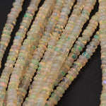 16 Inches Ethiopian Opal Beads Rondelle Graduating 3mm 4mm AAA Super Flashy Fiery Rainbow Yellow Opal Smooth Rondelle Beads 16" Strand A2