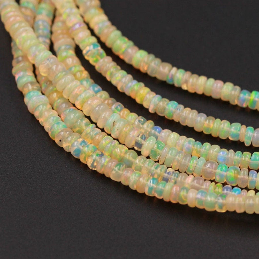 16 Inches Ethiopian Opal Beads Rondelle Graduating 3mm 4mm AAA Super Flashy Fiery Rainbow Yellow Opal Smooth Rondelle Beads 16" Strand