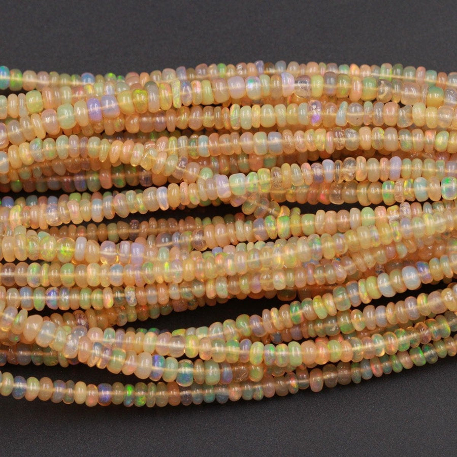 16 Inches Ethiopian Opal Beads Rondelle Graduating 3mm 4mm AAA Super Flashy Fiery Rainbow Yellow Opal Smooth Rondelle Beads 16" Strand A6