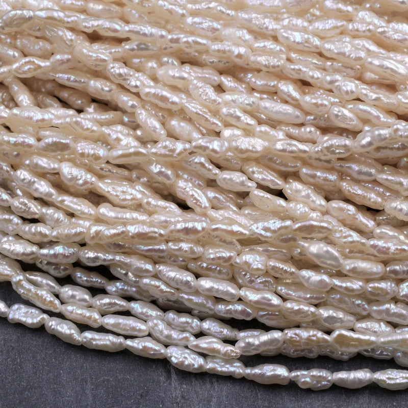 Small Slim Long Rice Seed Pearls Genuine Freshwater White Pearl 6mm Irregular Oval Nugget Shape Silvery White Pearl 16" Strand