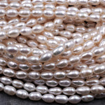 Genuine Freshwater White Pearl Oval Rice Shape 8mm Iridescent High Luster 16" Strand