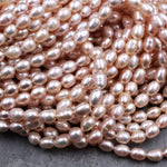Genuine Freshwater Natural Pink Peach Pearl Oval Rice Shape 8mm Iridescent High Luster Pearl 16" Strand
