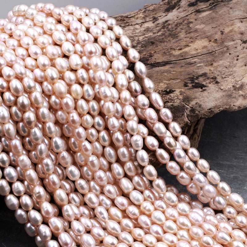 Genuine Freshwater Natural Pink Peach Pearl Oval Rice Shape 8mm Iridescent High Luster Pearl 16" Strand