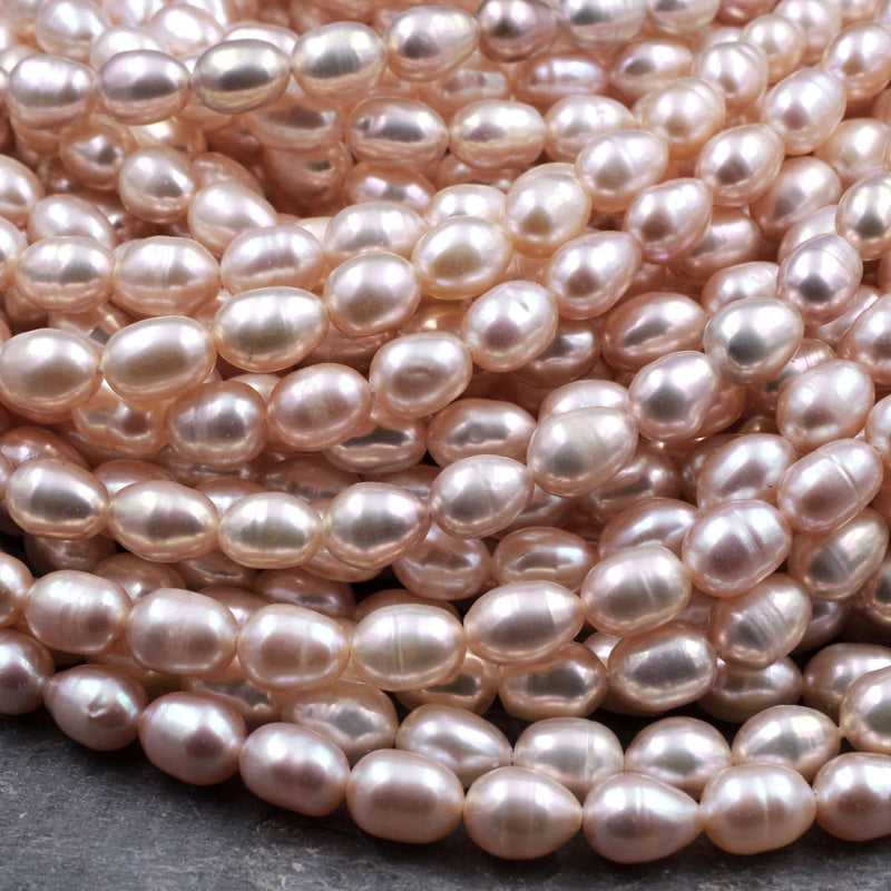 Genuine Freshwater Natural Pink Peach Pearl Oval Rice Shape 8mm Iridescent High Luster Pearl 16" Strand