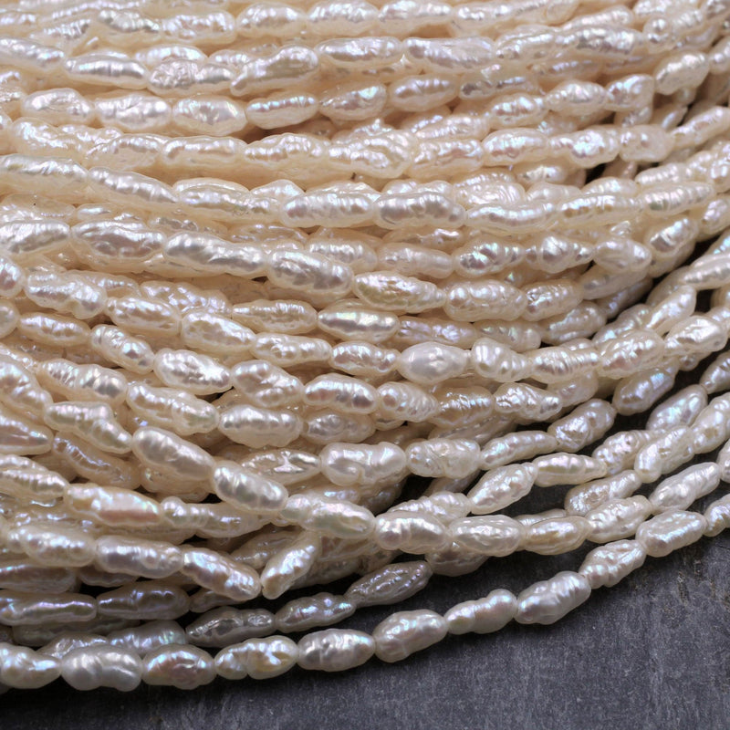 Small Slim Long Rice Seed Pearls Genuine Freshwater White Pearl 6mm Irregular Oval Nugget Shape Silvery White Pearl 16" Strand