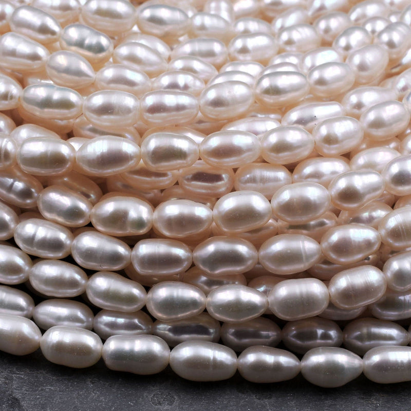 Genuine Freshwater White Pearl Oval Rice Shape 8mm Iridescent High Luster 16" Strand