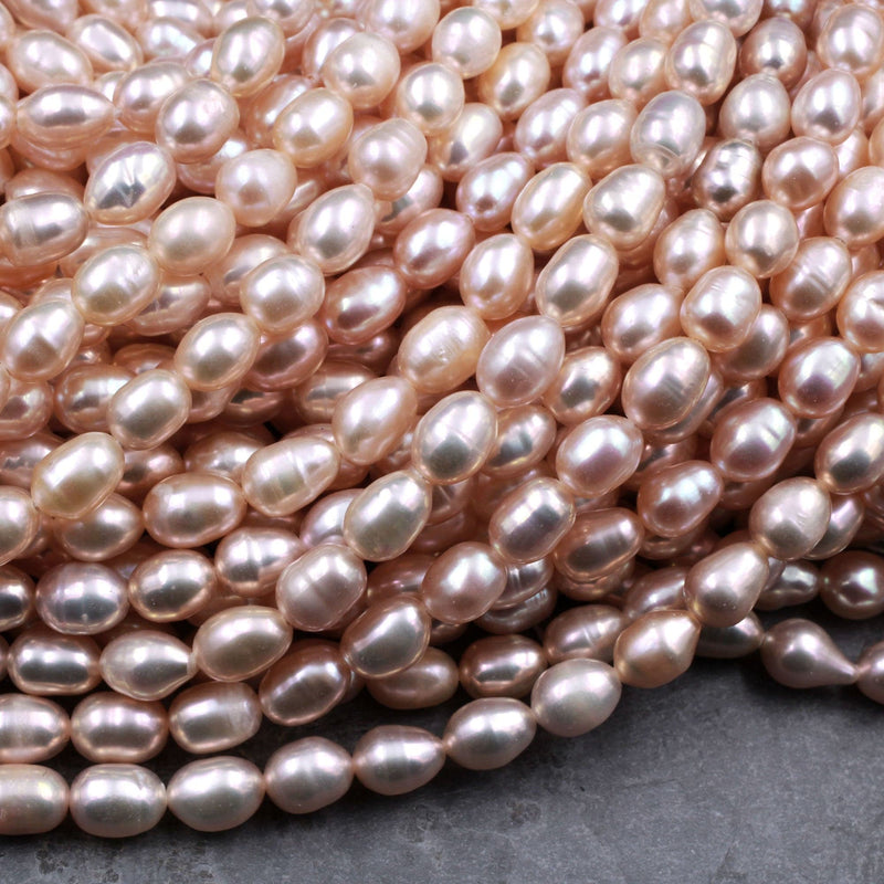 Genuine Freshwater Natural Pink Peach Pearl Oval Rice Shape 8mm Iridescent High Luster Pearl 16" Strand