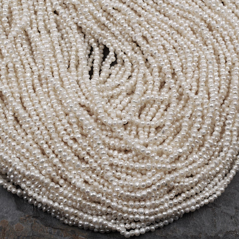 WHOLESALE 2 mm Tiny Seed Pearl Beads Natural White Pink Or Gray Color –  QualityBeadMart