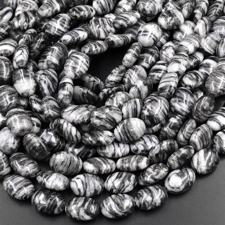 AAA Natural Black Web Jasper Oval Beads 10x14mm 15.5" Strand