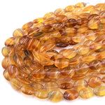 Natural Rainbow Fluorite Oval Beads Golden Yellow Mauve Gemstone 15.5" Strand