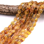 Natural Rainbow Fluorite Oval Beads Golden Yellow Mauve Gemstone 15.5" Strand