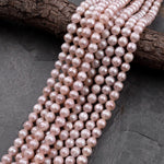 Faceted Genuine Natural Freshwater Pink Round Pearls 16" Strand