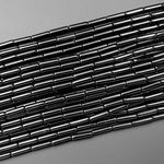 Natural Black Onyx Thin Long Tube Beads 14mm 15.5" Strand