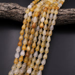 AAA Extra Translucent Natural Yellow Aventurine Teardrop Beads 15.5" Strand