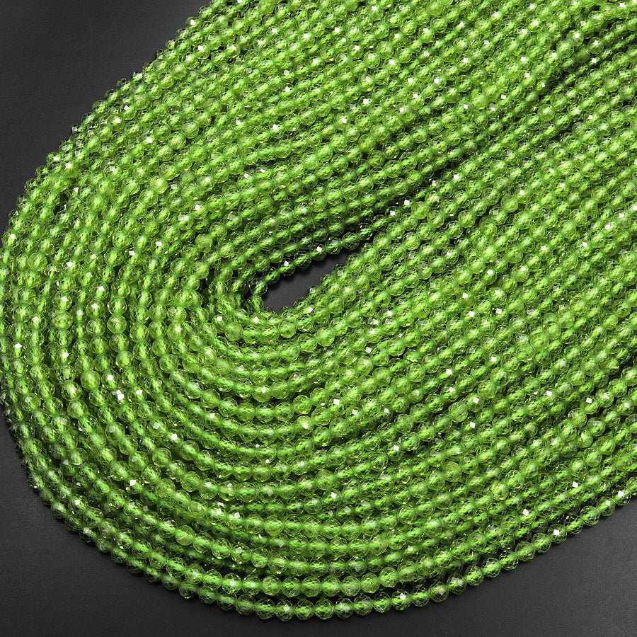 AAA+ Natural Green Peridot 4mm Faceted Round Beads 15.5" Strand