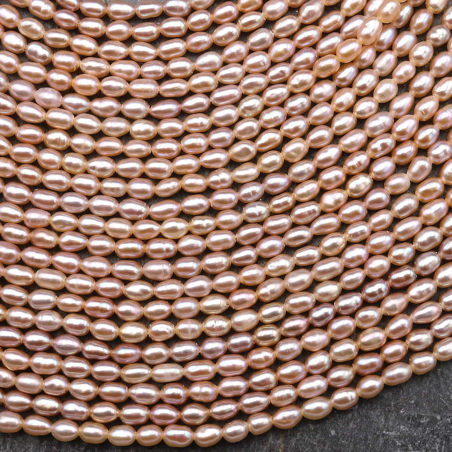 AAA Genuine Freshwater Small Pink Rice Seed Pearls 3mm Oval 15.5" Strand